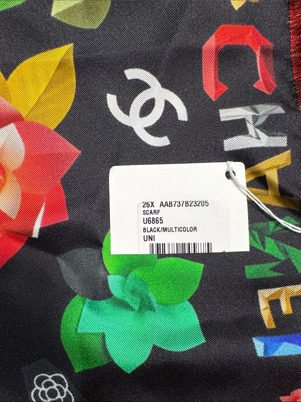 CHANEL Black Floral Logo Silk Scarf with Red Fringe